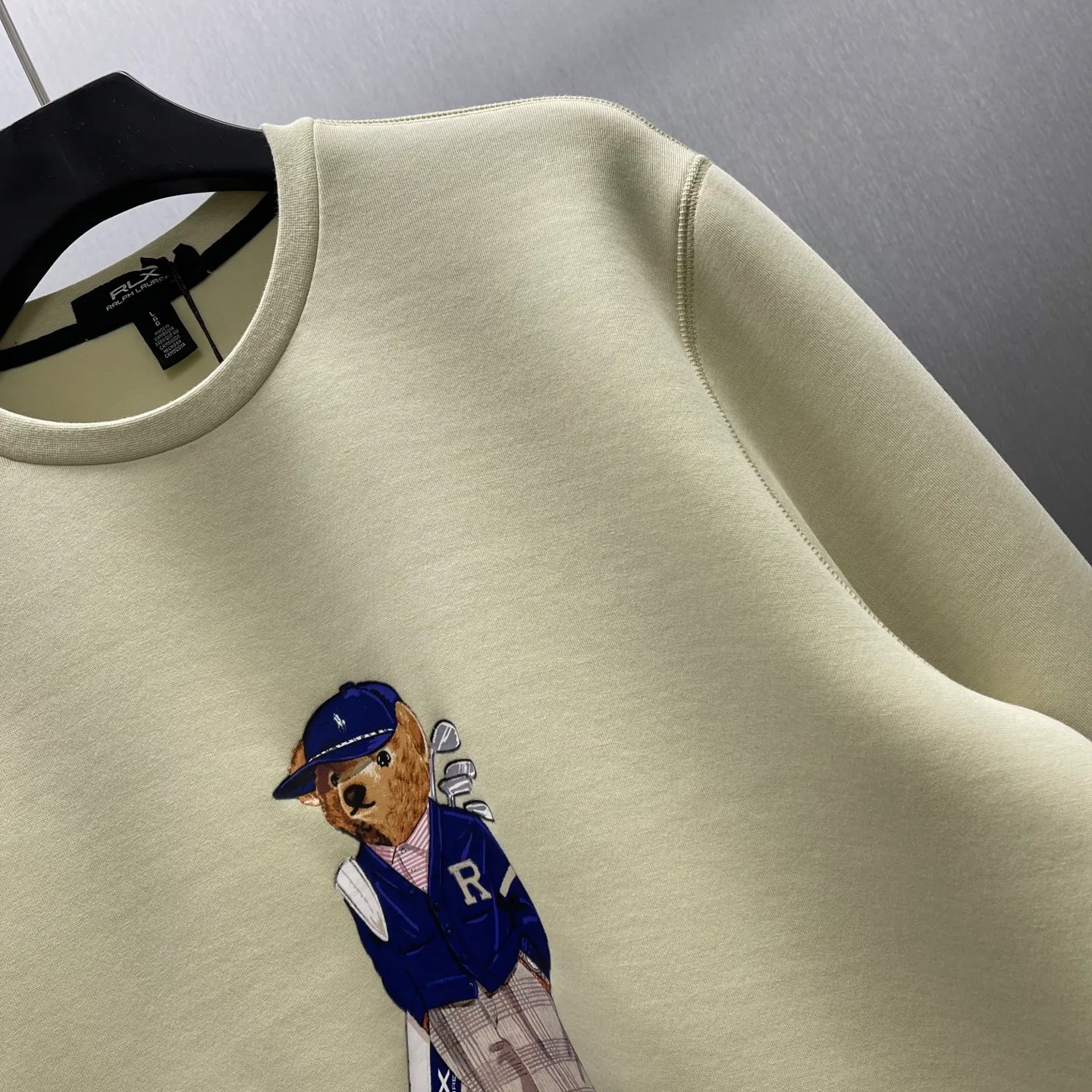P350 🧧LRX Ralph Lauren Bear Sweatshirt Size: S-XL Carefully made in Italy, this sweatshirt is decorated with an elegant Polo Bear patch that reflects Purple Label's relentless pursuit of craftsmanship. Our beloved mascot is wearing this season's Purple Label collection suit on the patch. The bear's entire outfit is made from actual fabrics from the collection, including the pinstripe Kent jacket, Gregory The trousers and matching spectator shoes feature refined details such as a sewn-in drawstring at the ends and a jersey-lined hood.